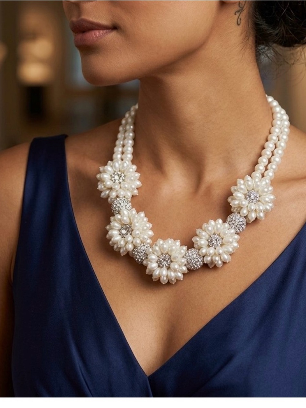 Feature a five A Grade freshwater pearl clusters and crystalize rhinestone balls
